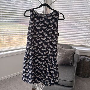 Swans tank top dress with pockets.